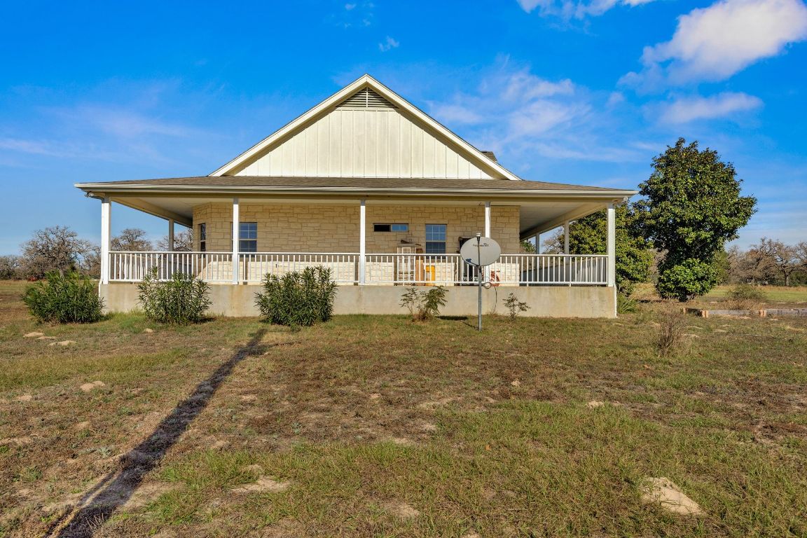 1949 Farm To Market Road 619 Elgin, TX 78621 - Photo 25 of 36 front view of a house with a yard