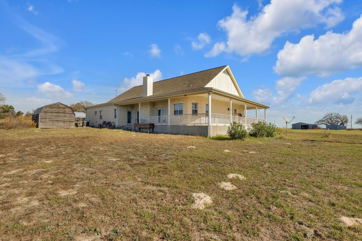 1949 Farm To Market Road 619 Elgin, TX 78621 - Photo 26 of 36 a front view of a house with a yard