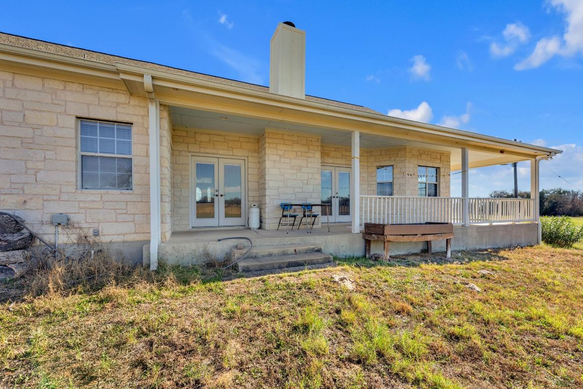 1949 Farm To Market Road 619 Elgin, TX 78621 - Photo 29 of 36 a front view of a house with garden