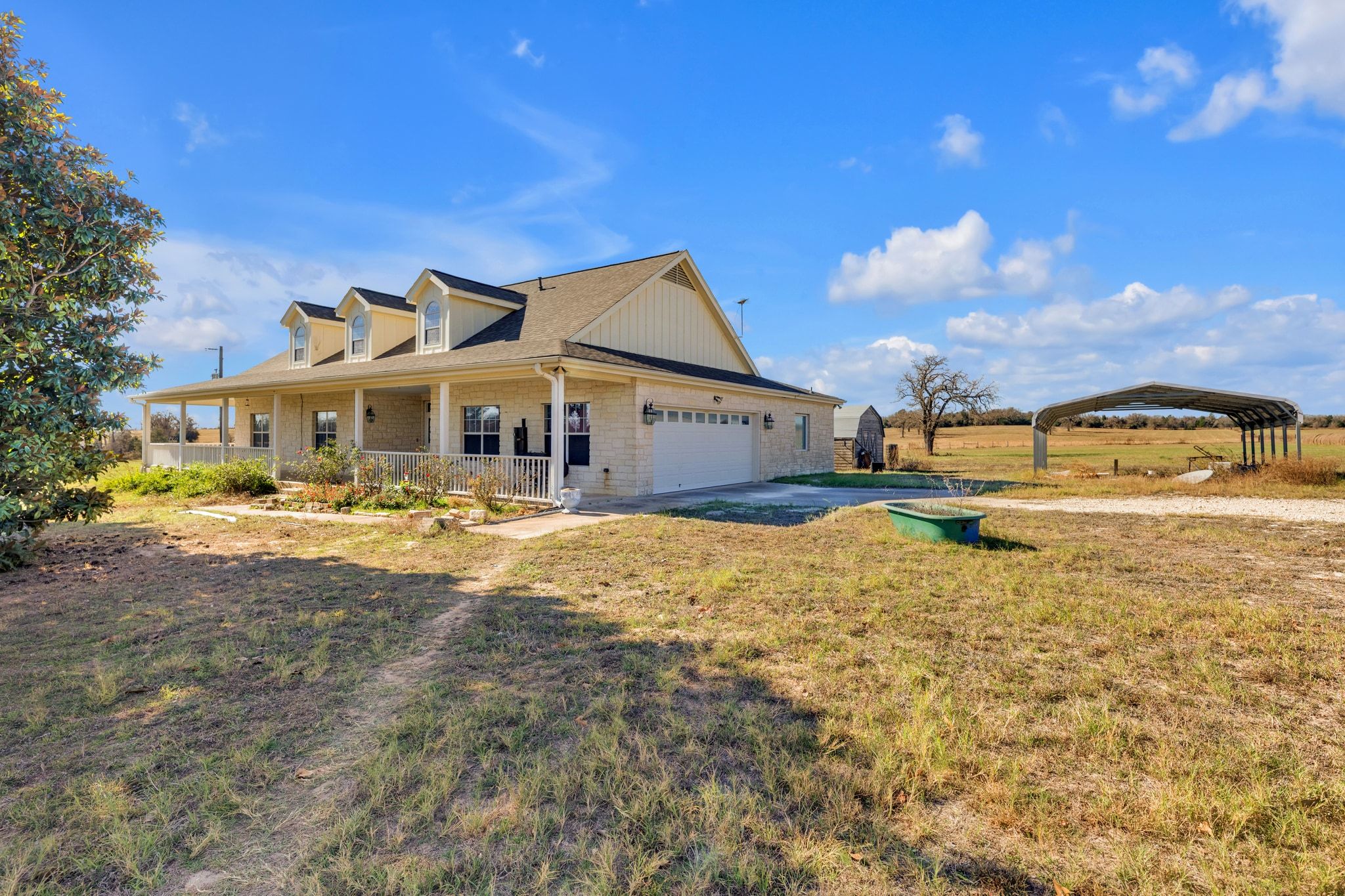 1949 Farm To Market Road 619 Elgin, TX 78621 - Photo 3 of 32 a front view of a house with a yard