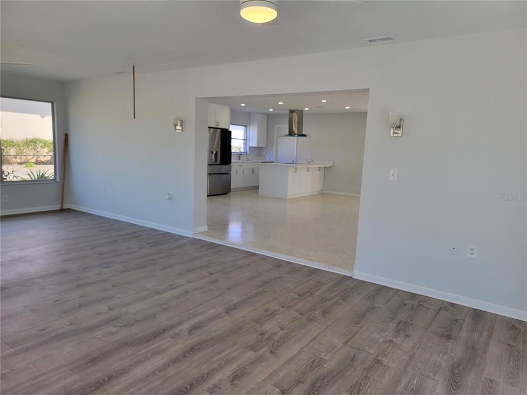 1732 Boca Raton Court Punta Gorda, FL 33950 - Photo 41 of 64 a view of a kitchen cabinets and wooden floor