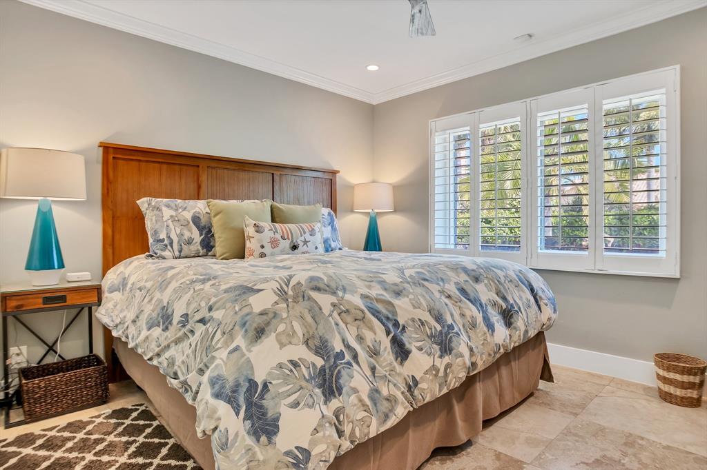 2013 Northeast 32nd Avenue Fort Lauderdale, FL 33305 - Photo 31 of 50 a bedroom with a bed and a window