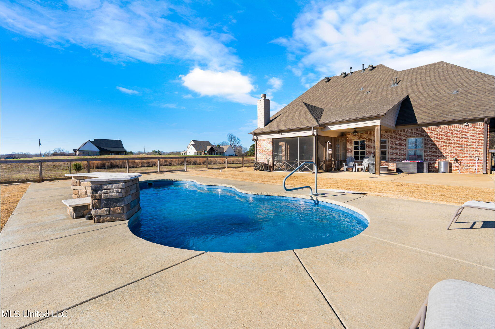 4883 West Oak Grove Road Hernando, MS 38632 - Photo 28 of 36 pool with waterfall