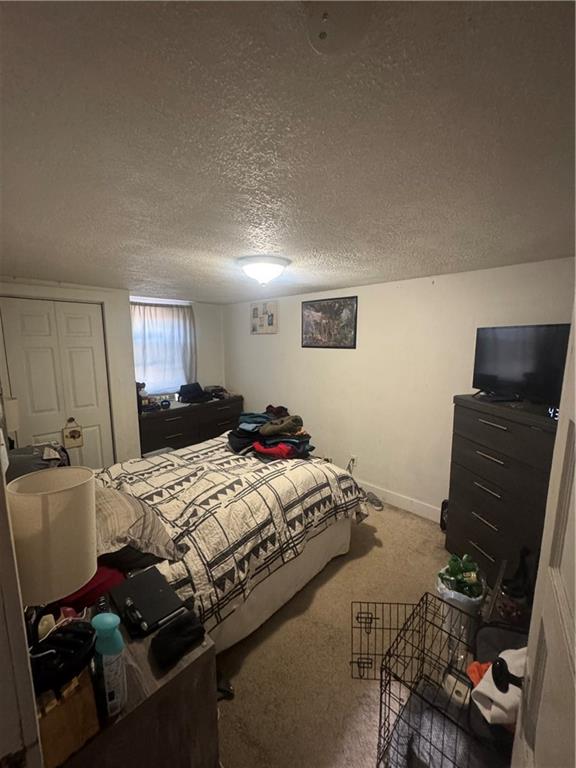 444 East Washington Street Rochester, PA 15074 - Photo 17 of 33 a bed room with a bed and furniture