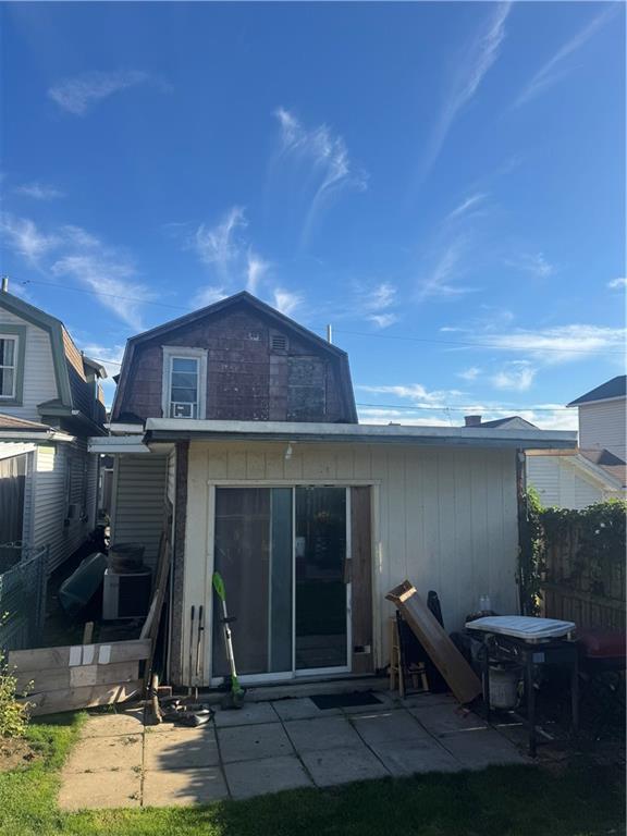 444 East Washington Street Rochester, PA 15074 - Photo 8 of 33 a front view of a house with garden