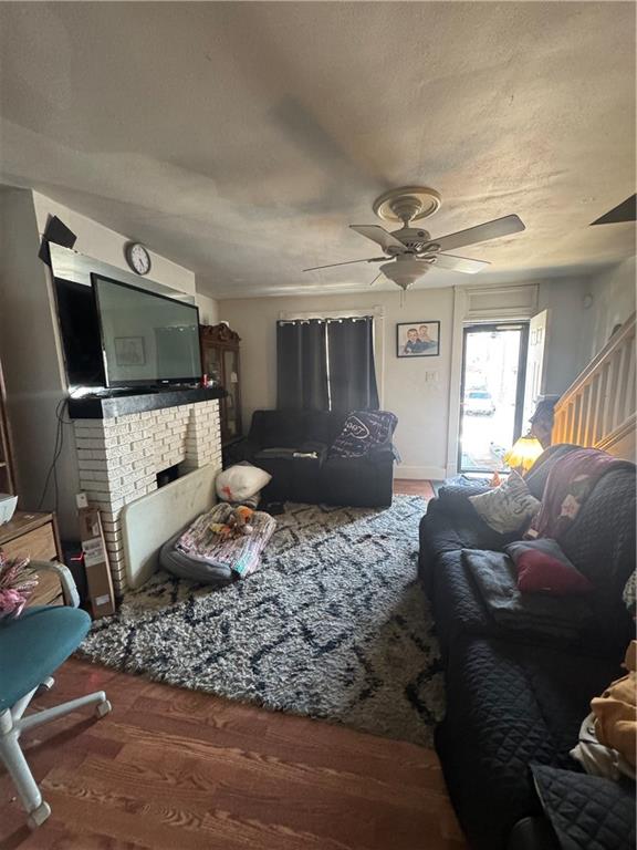 444 East Washington Street Rochester, PA 15074 - Photo 10 of 33 a living room with furniture and a flat screen tv