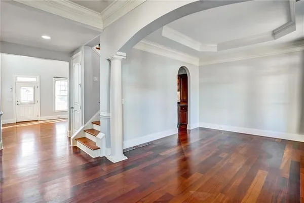 a view of a livingroom with wooden floor