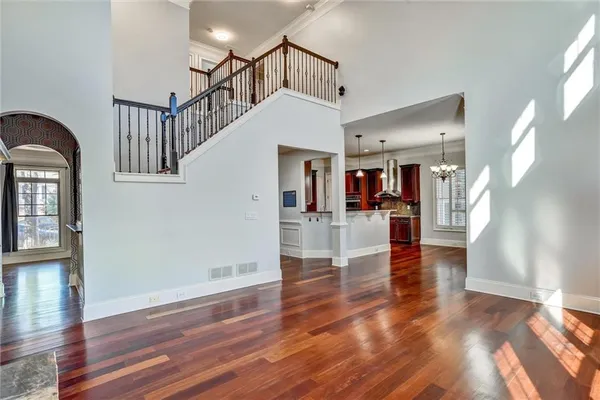 a view of livingroom with hardwood floor and a ceiling fan