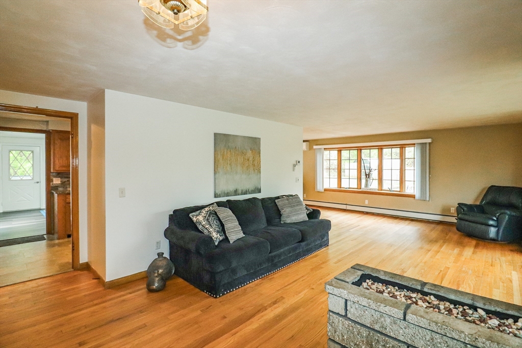 105 Gilbertville Road Ware, MA 01082 - Photo 11 of 41 a living room with furniture and a couch