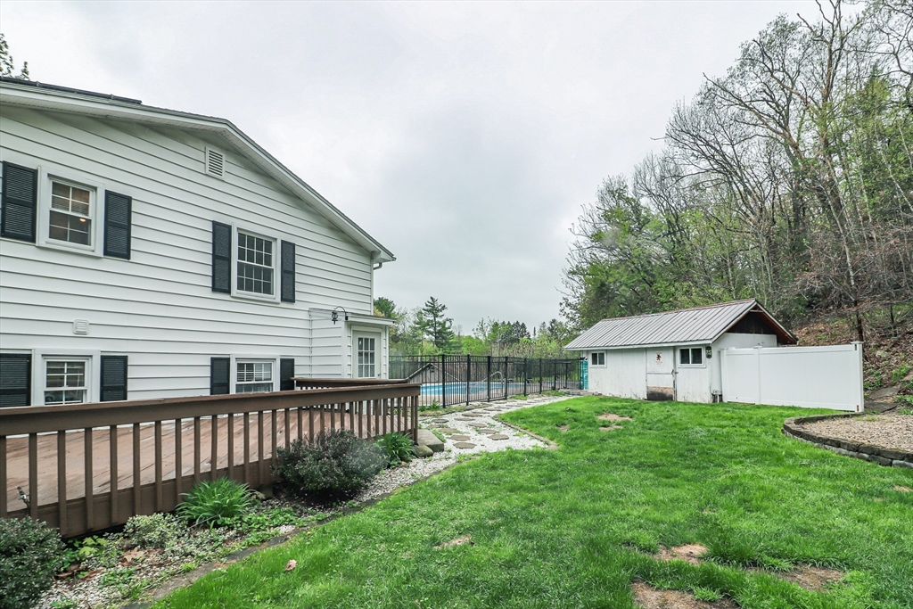 105 Gilbertville Road Ware, MA 01082 - Photo 36 of 41 a front view of a house with garden