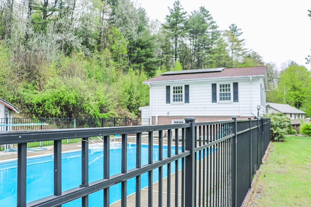 105 Gilbertville Road Ware, MA 01082 - Photo 40 of 41 a view of a wooden fence and trees