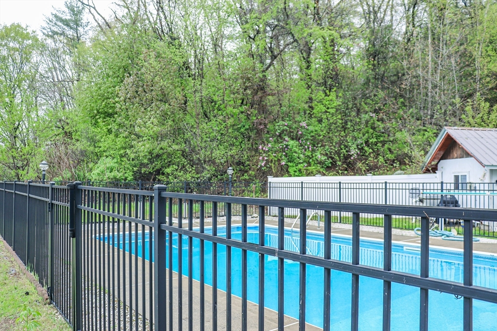 105 Gilbertville Road Ware, MA 01082 - Photo 4 of 41 a view of a wooden fence