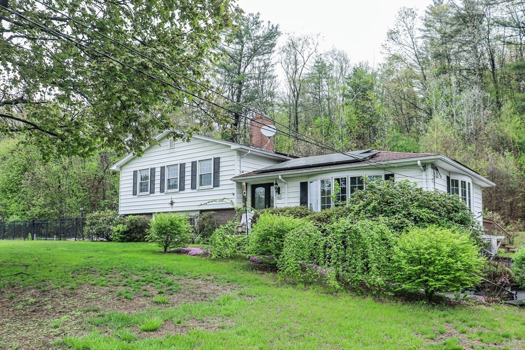 105 Gilbertville Road Ware, MA 01082 - Photo 41 of 41 a front view of a house with a yard