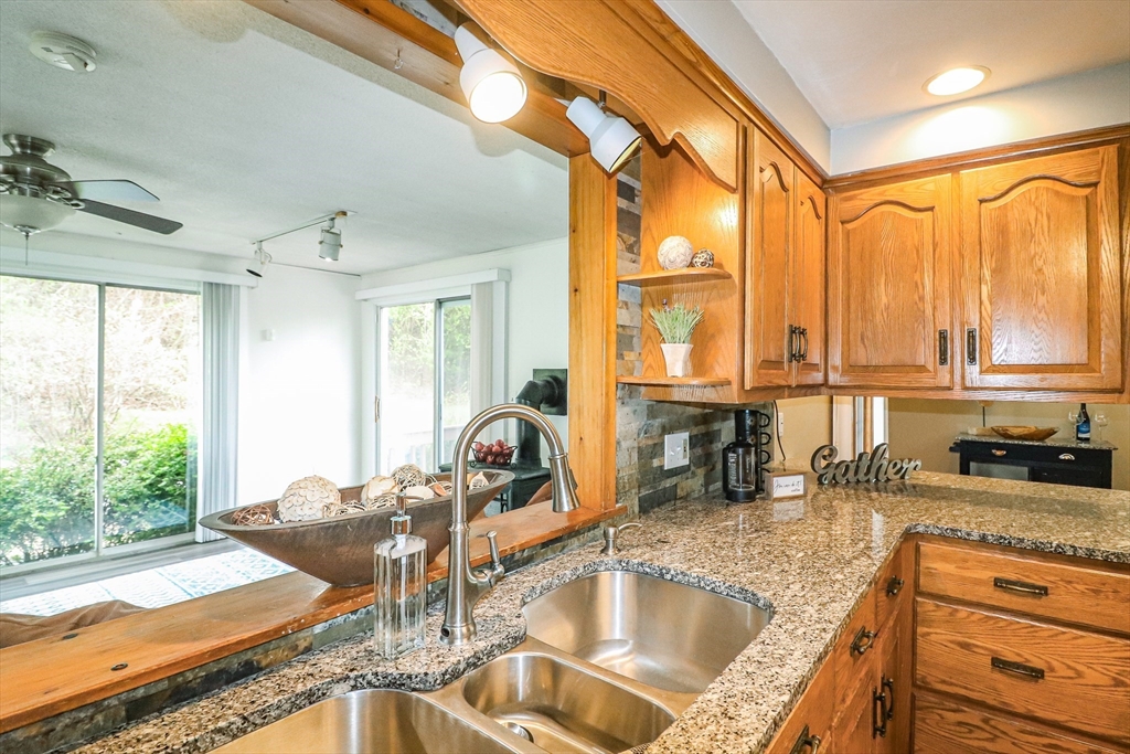 105 Gilbertville Road Ware, MA 01082 - Photo 7 of 41 a kitchen with sink refrigerator and large window
