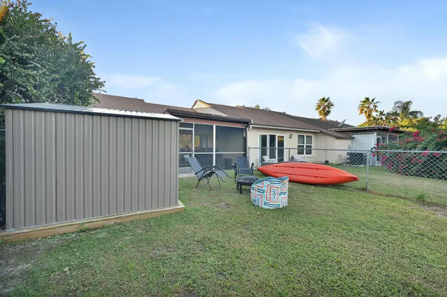 a view of a back yard of the house