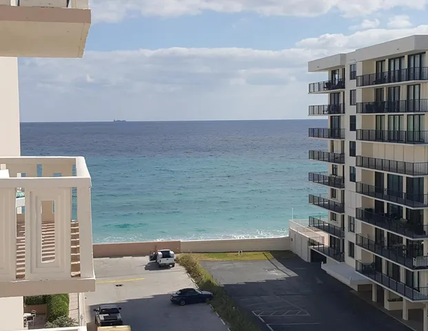 a view of roof with city view