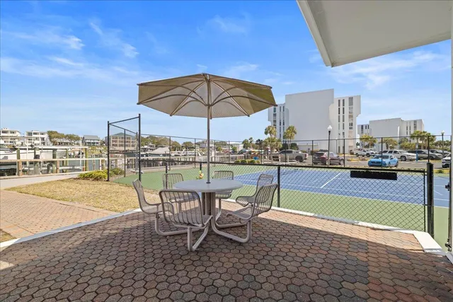 a view of a swimming pool with chairs
