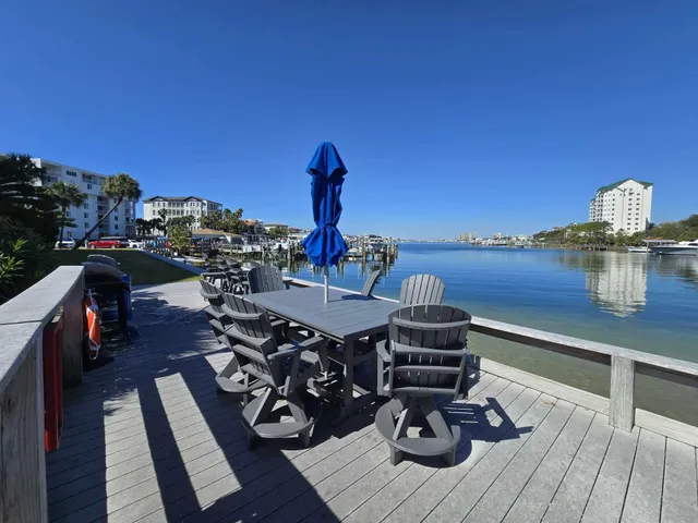 a view of a balcony with chairs