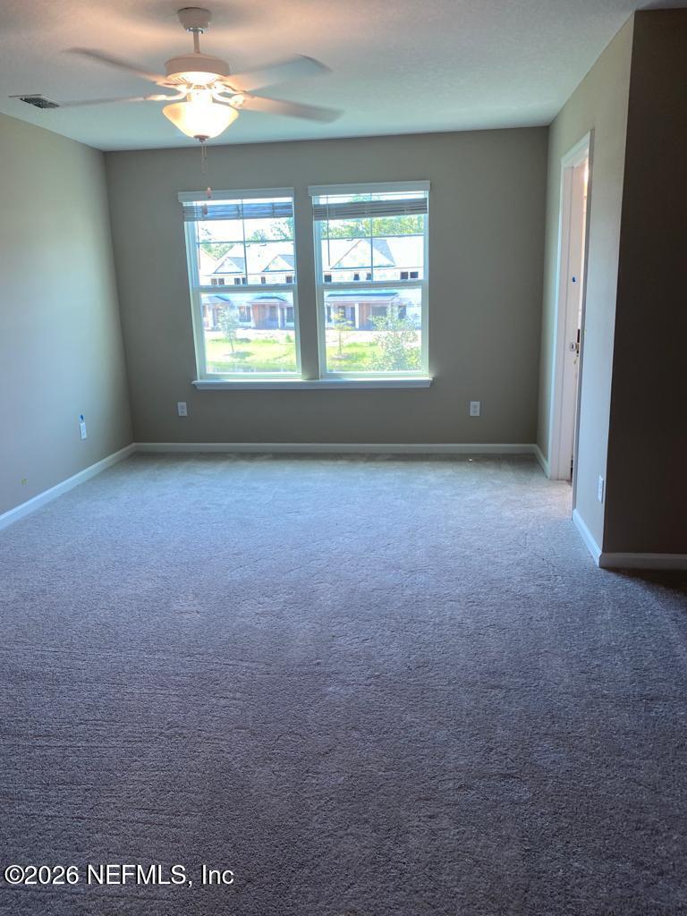 243 Boracay Circle St. Johns, FL 32259 - Photo 14 of 20 an empty room with a window