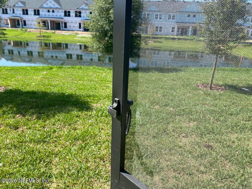 243 Boracay Circle St. Johns, FL 32259 - Photo 17 of 20 a view of building with a yard