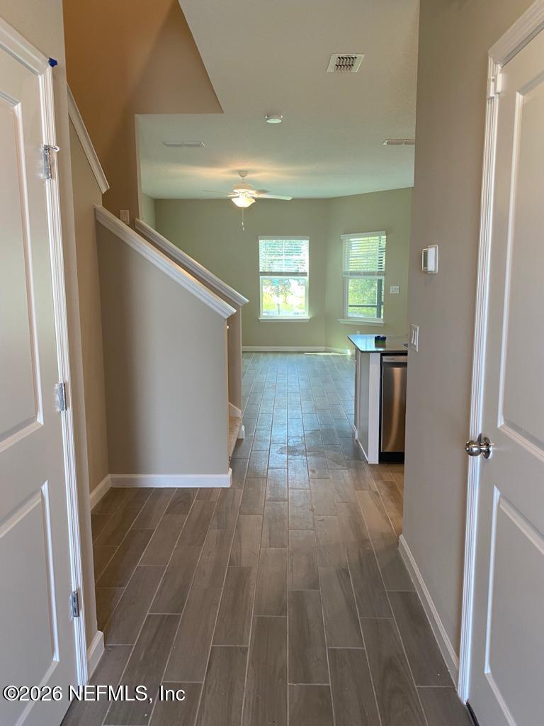 243 Boracay Circle St. Johns, FL 32259 - Photo 4 of 20 wooden floor in a hall with an entryway