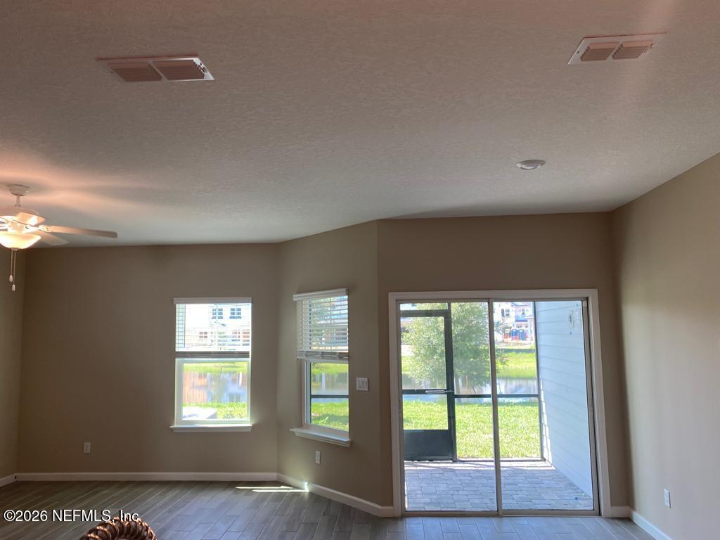 243 Boracay Circle St. Johns, FL 32259 - Photo 5 of 20 a view of an empty room with a window