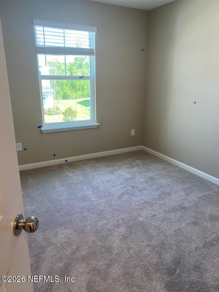 243 Boracay Circle St. Johns, FL 32259 - Photo 9 of 20 an empty room with a window