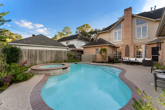 a view of a house with swimming pool