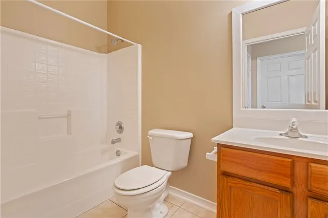 a bathroom with a sink a toilet and a bathtub