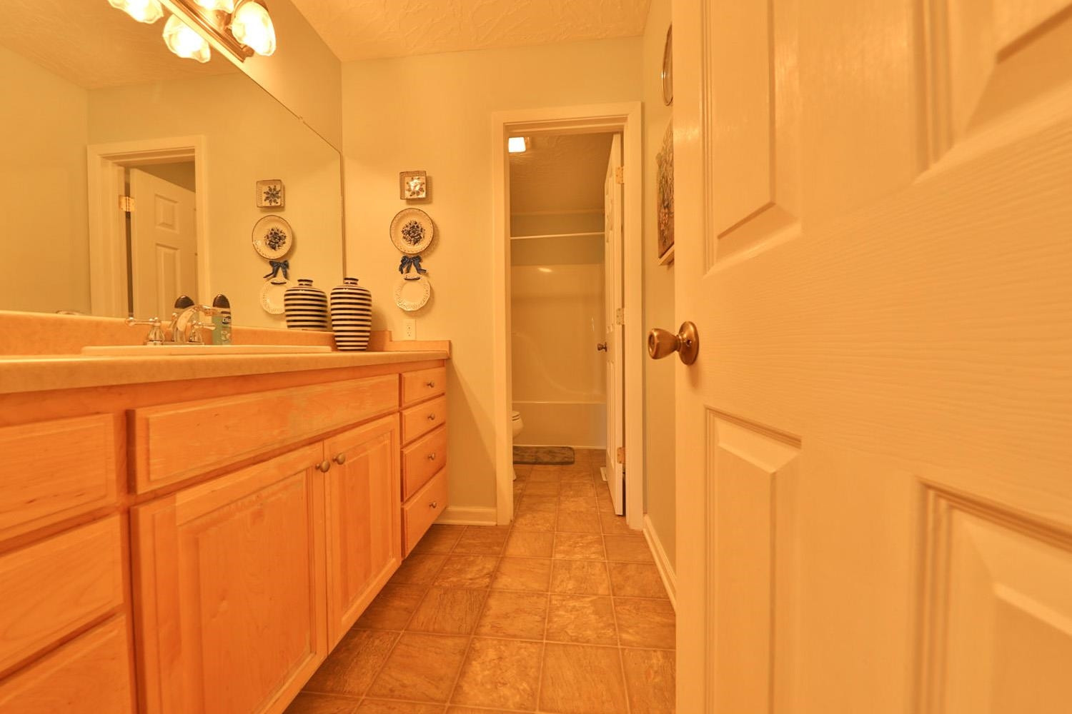 1937 Hyndsver Road Martin, TN 38237 - Photo 11 of 21 a spacious bathroom with a double vanity sink and mirror