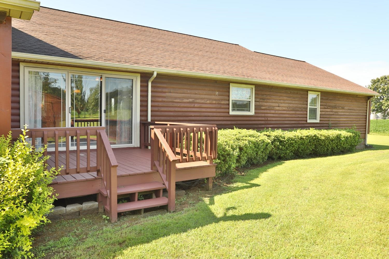 1937 Hyndsver Road Martin, TN 38237 - Photo 14 of 21 a front view of a house with a yard table and chairs