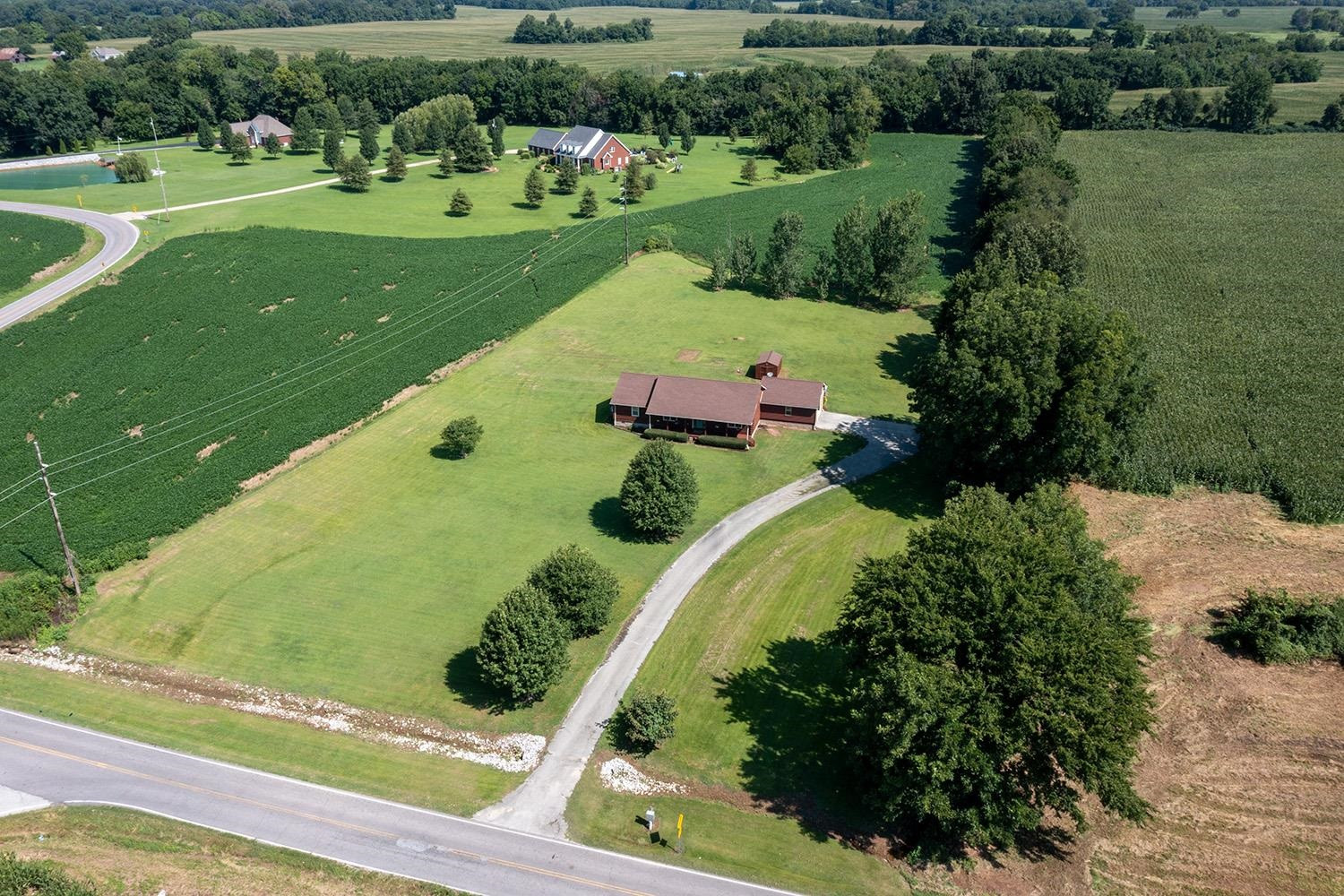 1937 Hyndsver Road Martin, TN 38237 - Photo 20 of 21 a view of a lake with a houses