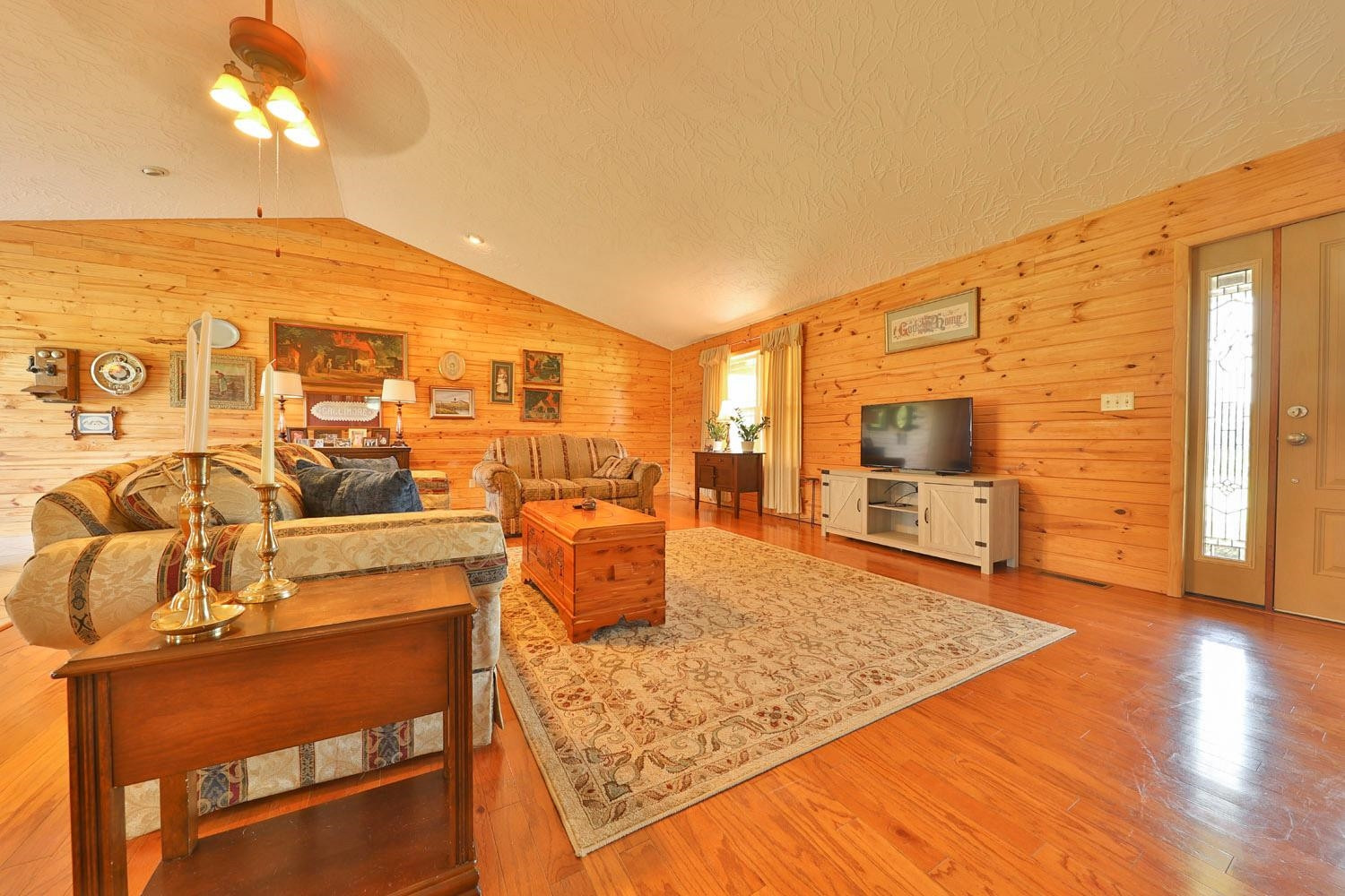 1937 Hyndsver Road Martin, TN 38237 - Photo 7 of 21 a living room with dining room and wooden floor
