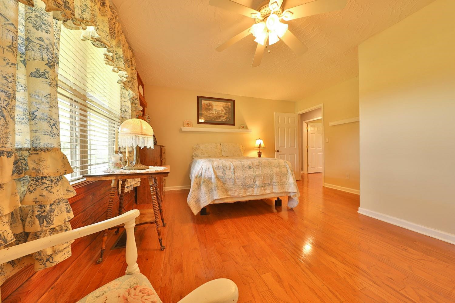 1937 Hyndsver Road Martin, TN 38237 - Photo 10 of 21 a bedroom with a bed and wooden floor