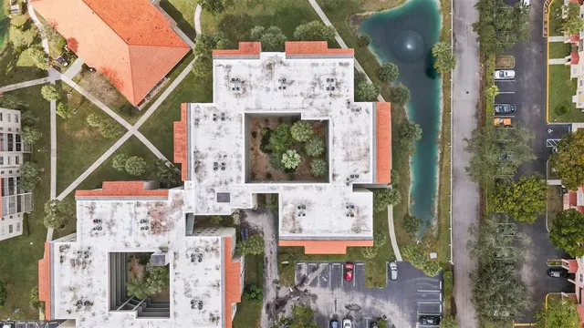 an aerial view of a house with a garden