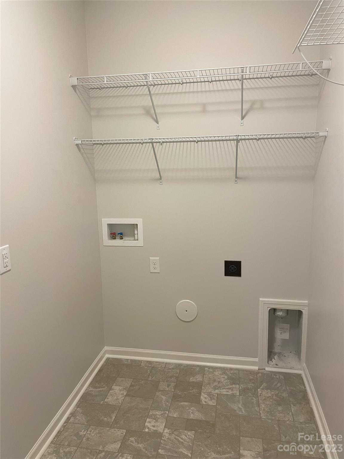 3144 Graceland Circle Pineville, NC 28134 - Photo 16 of 24 a view of a room with racks on the wall