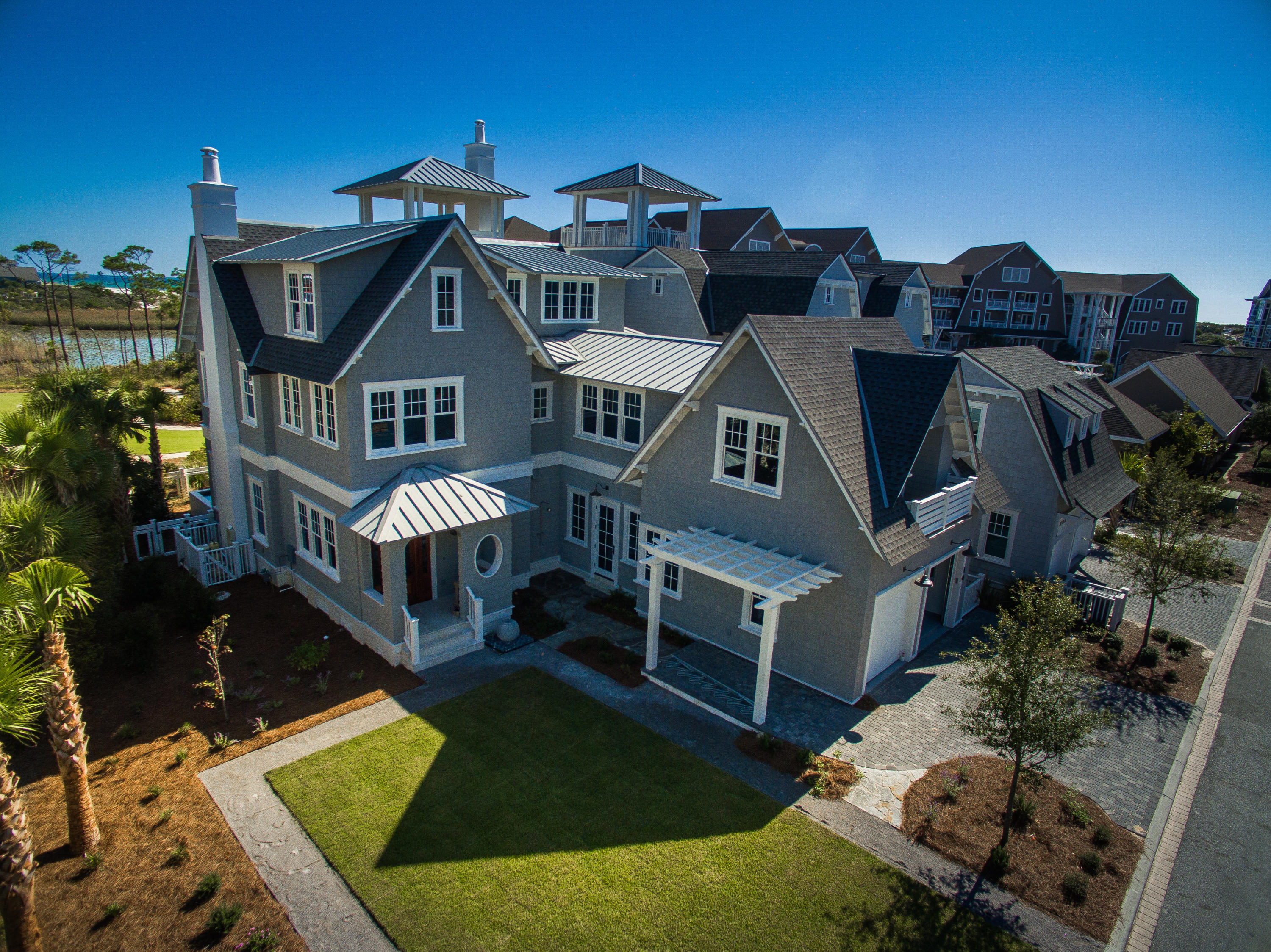 14 Compass Point Way Watersound, FL 32461 - Photo 1 of 5 an aerial view of a house with a yard