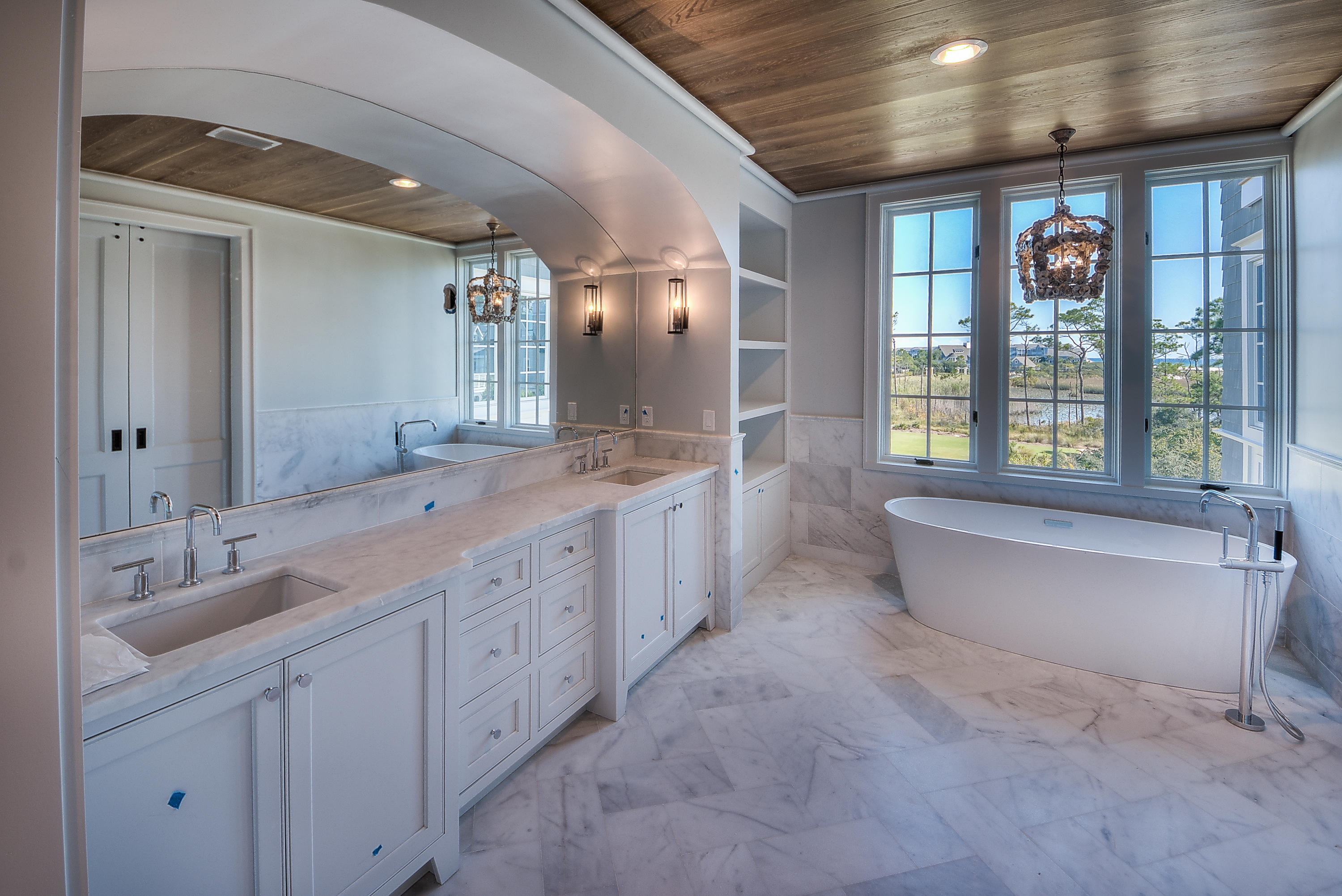14 Compass Point Way Watersound, FL 32461 - Photo 5 of 5 a spacious bathroom with a double vanity sink a large mirror and a bathtub