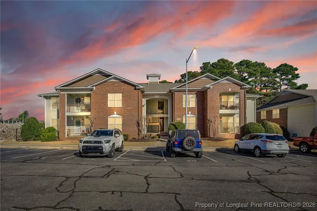 a view of a car parked in front of house
