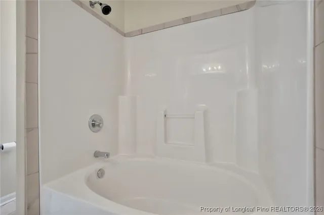 a view of a building with a street