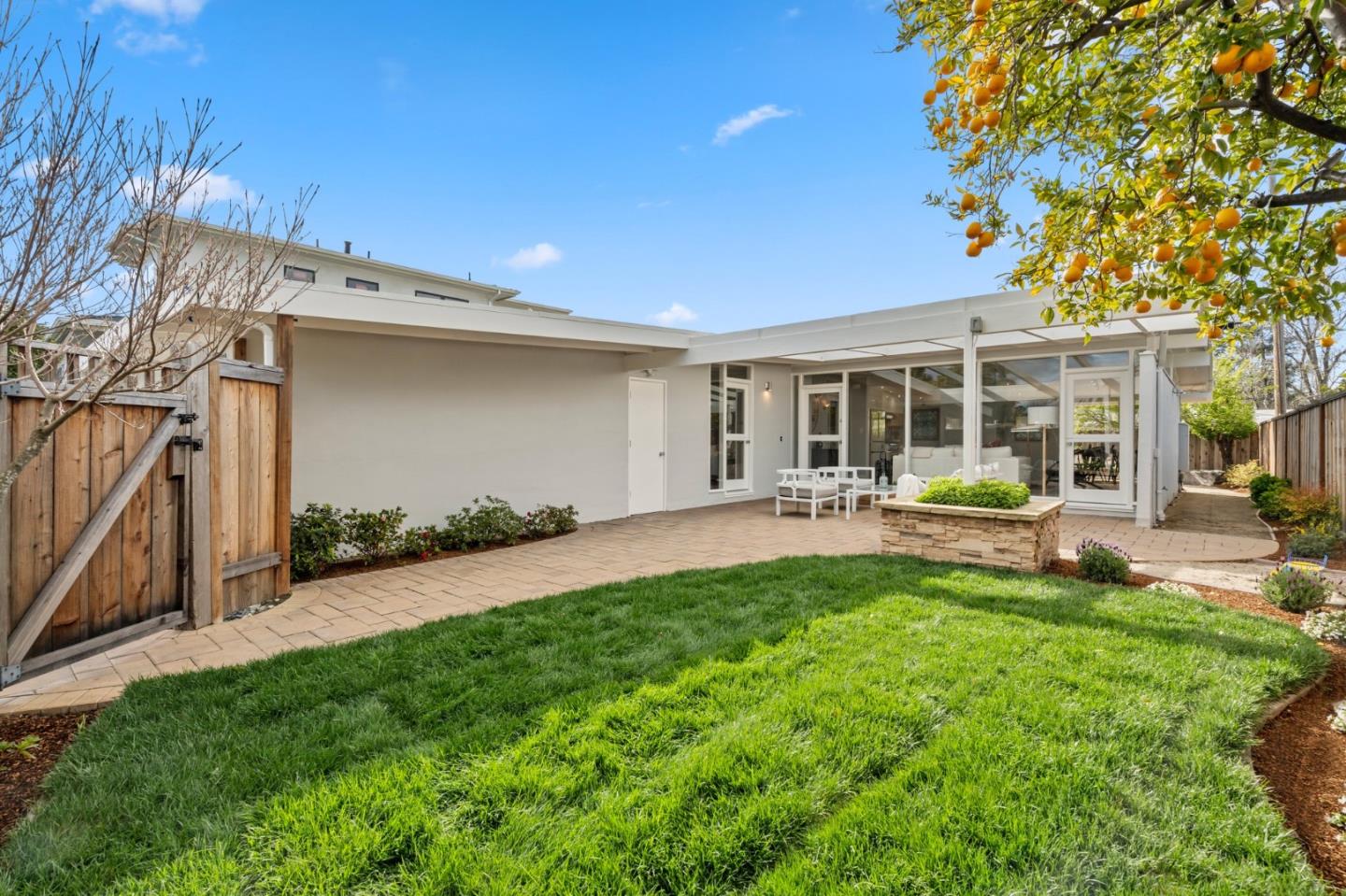 238 Hamilton Avenue Mountain View, CA 94043 - Photo 1 of 18 a view of a house with backyard porch and sitting area
