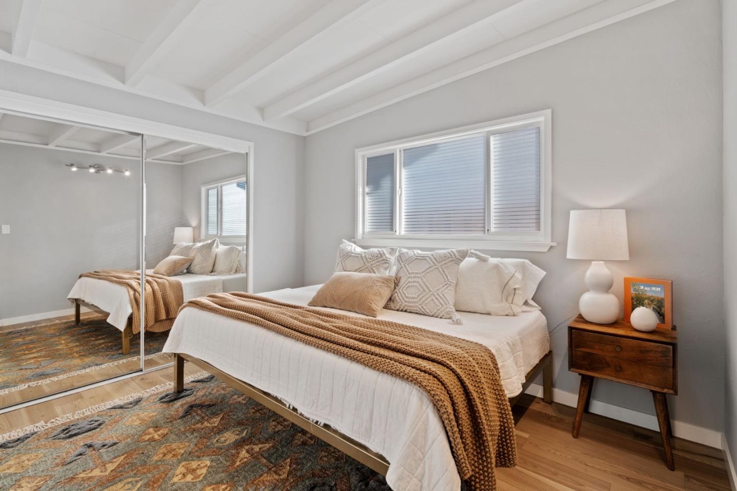 238 Hamilton Avenue Mountain View, CA 94043 - Photo 12 of 18 a bedroom with a bed and a couch