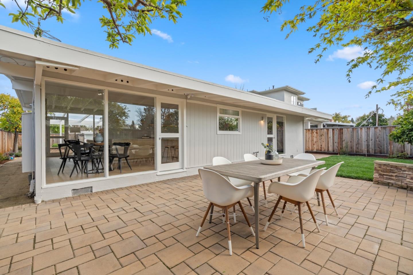 238 Hamilton Avenue Mountain View, CA 94043 - Photo 16 of 18 a view of a patio with a table and chairs
