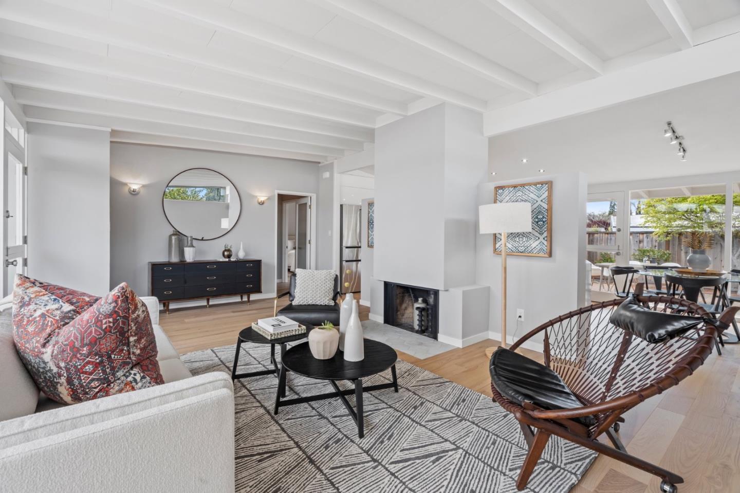 238 Hamilton Avenue Mountain View, CA 94043 - Photo 5 of 18 a living room with furniture and a fireplace