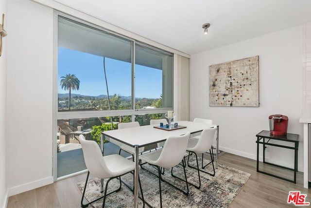 a kitchen with a sink a stove and refrigerator