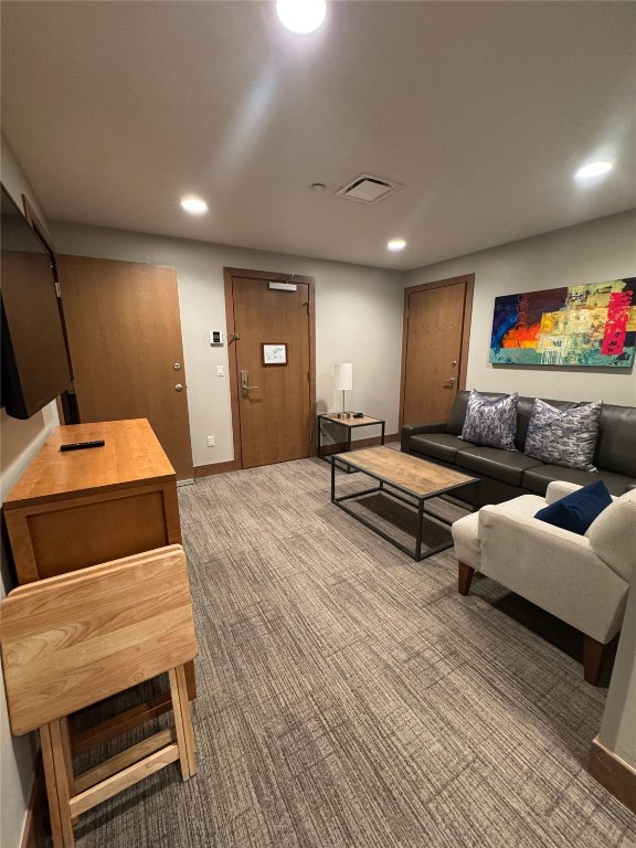 1627 Ski Hill Road, Unit 2236EGHI Breckenridge, CO 80424 - Photo 16 of 23 a living room with furniture and a flat screen tv
