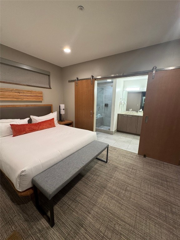 1627 Ski Hill Road, Unit 2236EGHI Breckenridge, CO 80424 - Photo 5 of 23 a bedroom with a bed and wooden floor