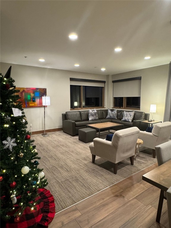 1627 Ski Hill Road, Unit 2236EGHI Breckenridge, CO 80424 - Photo 8 of 23 a living room with furniture and flowers