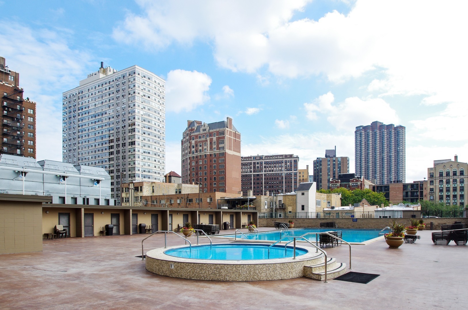 655 West Irving Park Road, Unit 910 Chicago, IL 60613 - Photo 13 of 14 a view of balcony with patio and lake view
