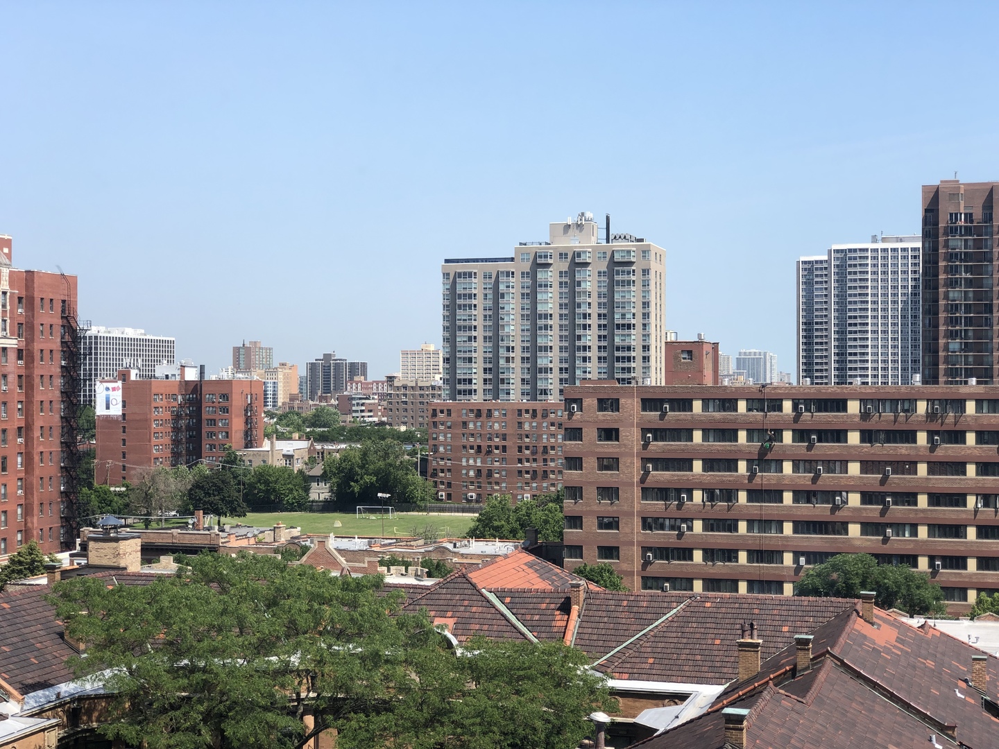 655 West Irving Park Road, Unit 910 Chicago, IL 60613 - Photo 3 of 14 a view of a city with tall buildings